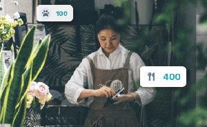 Florist arranging flowers in a shop